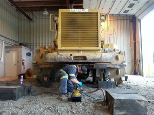 photo of working on machine